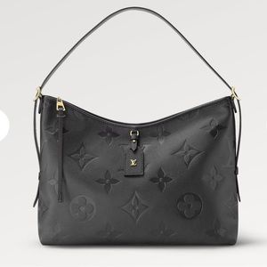 Black Louis Vuitton carryall MM and pouch. Make offer